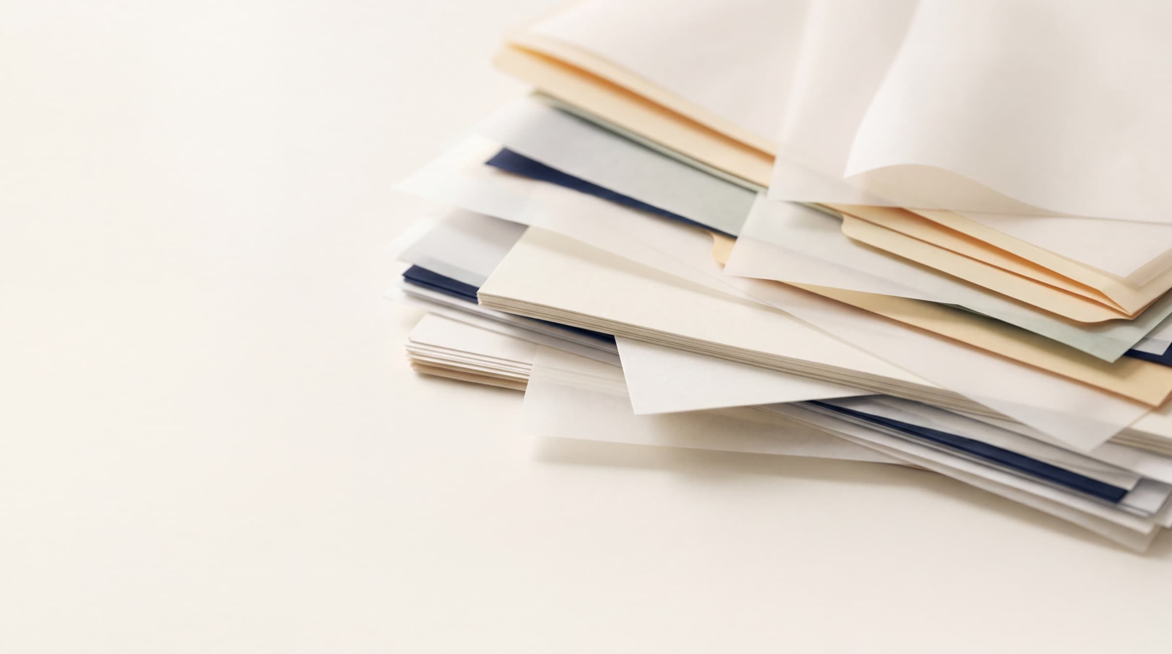 Admissions documents, folders, and planning materials arranged on a desk